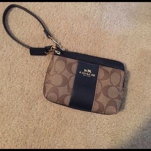 Navy blue double zip Coach wristlet