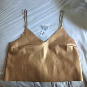Kendall and Kylie rose gold crop top.