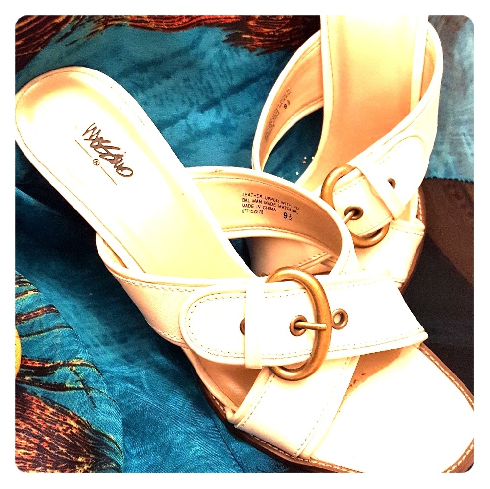 White wedged sandals with gold buckles