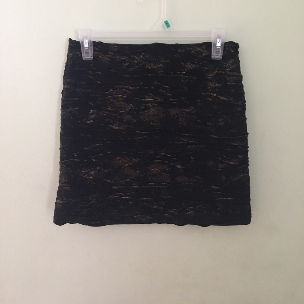 gold and black mini skirt