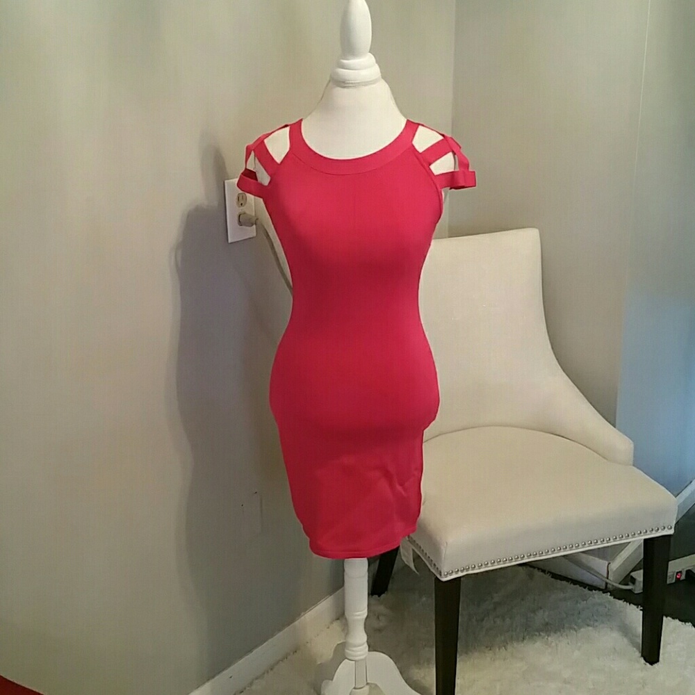 Bebe caged in  bodycon dress!