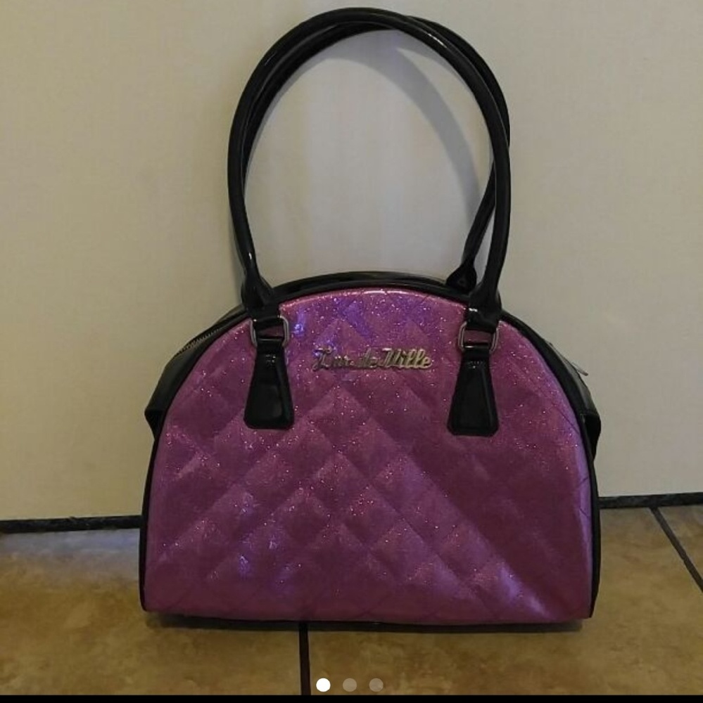 Lux De Ville purple atomic bowler