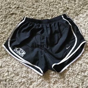 Nike running shorts with Advocare logo