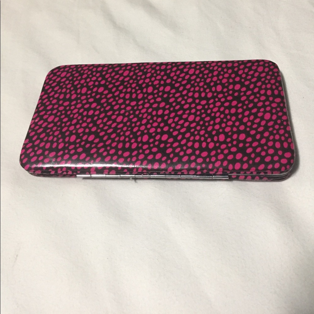 Adorable pink and black wallet.