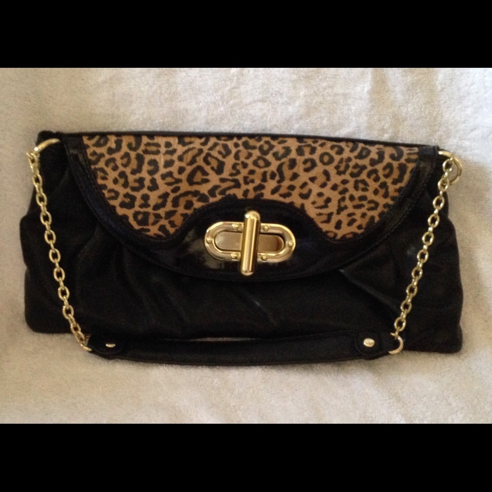 Daisy Fuentes animal print clutch