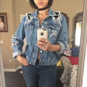 Distressed denim jacket