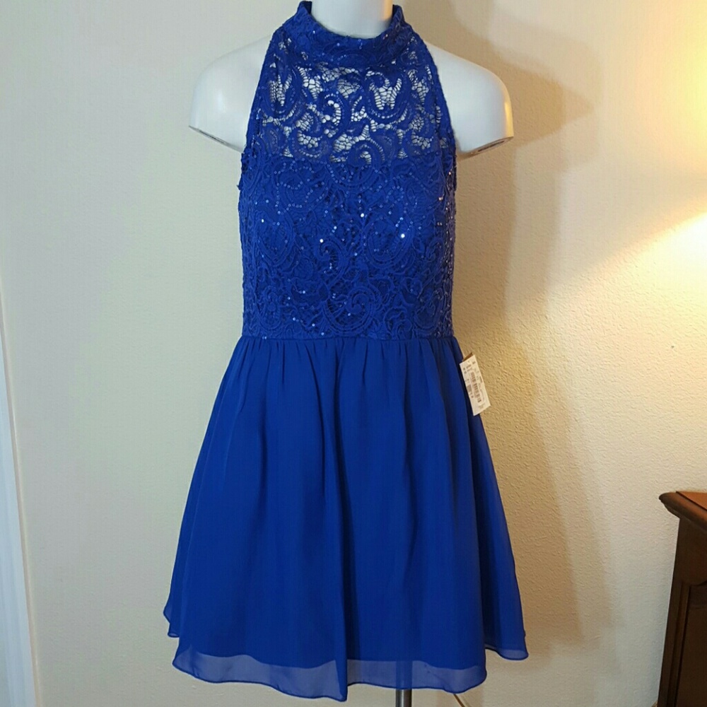 Xtraodinary party sequin lace silhouette dress.