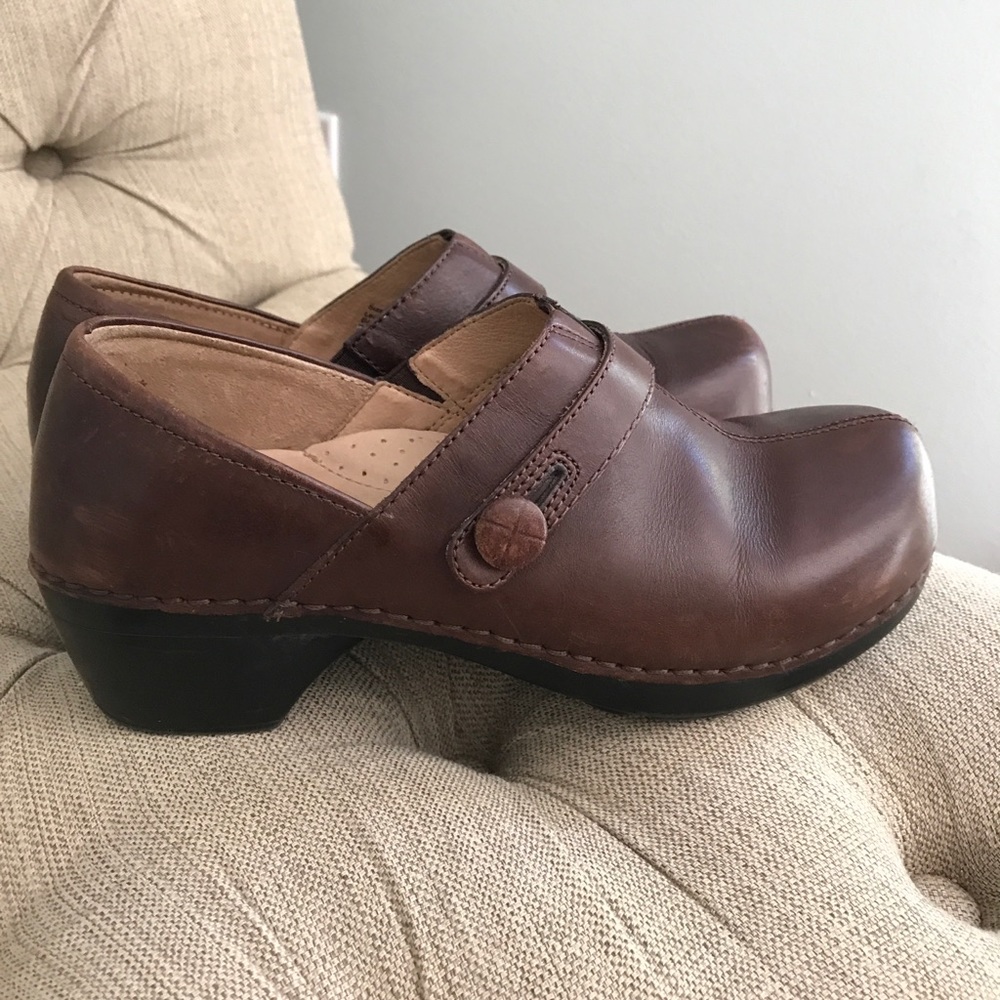 Dansko brown clogs with cute button detail
