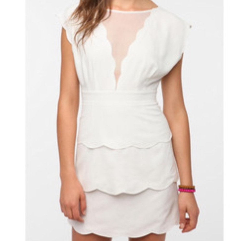 White scalloped dress with mesh panel
