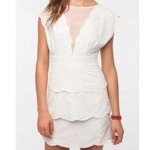 White scalloped dress with mesh panel