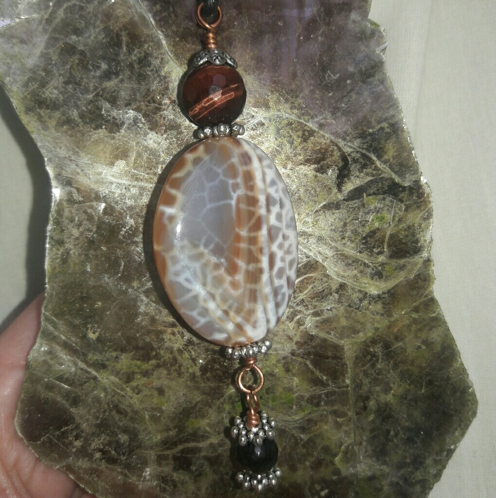 Snakeskin aggot pendant with tigereye