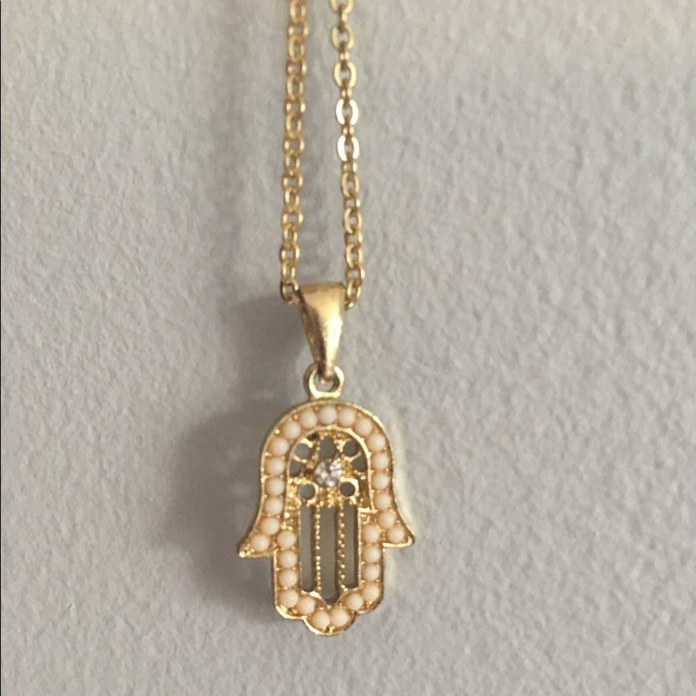 Gold hamsa hand necklace
