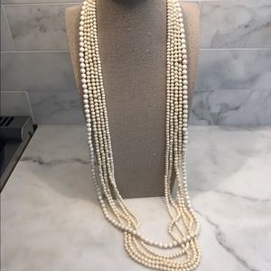 Set: 5 ivory strand necklaces