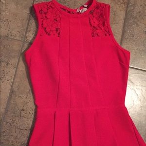 Red pleated blouse
