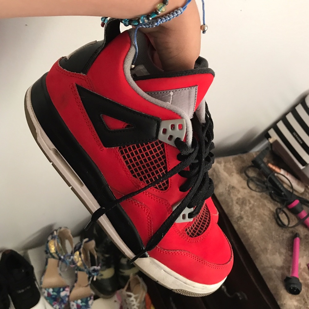 Fire red Jordan 4s