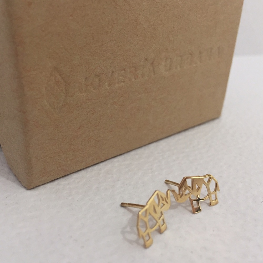 18K gold and silver origami 🐘 earrings.
