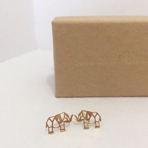 18K gold and .925 silver origami 🐘 earrings.