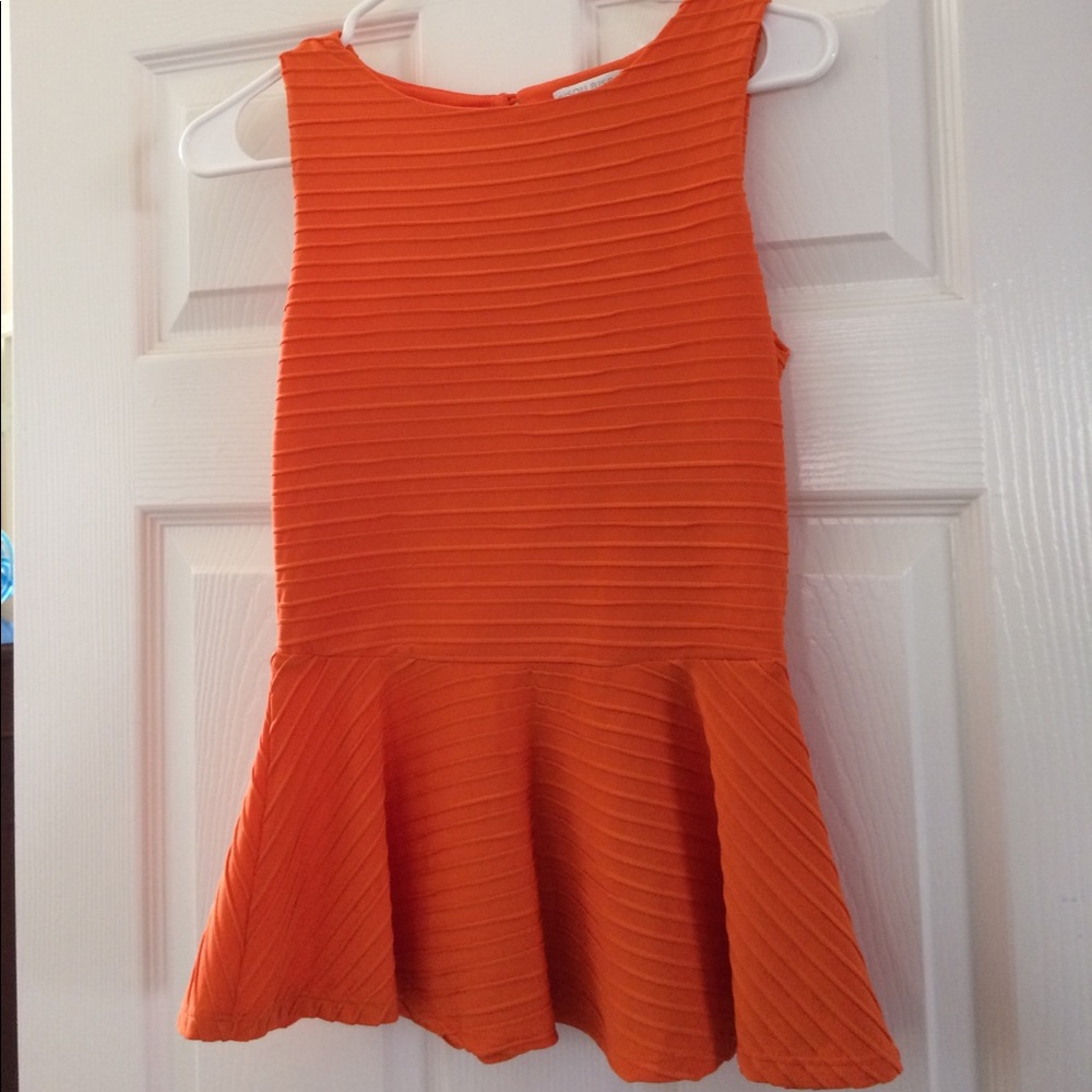 Bisou Bisou peplum sleeveless top