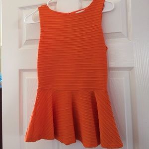 Bisou Bisou peplum sleeveless top