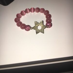 Pink bracelet with silver Jewish star