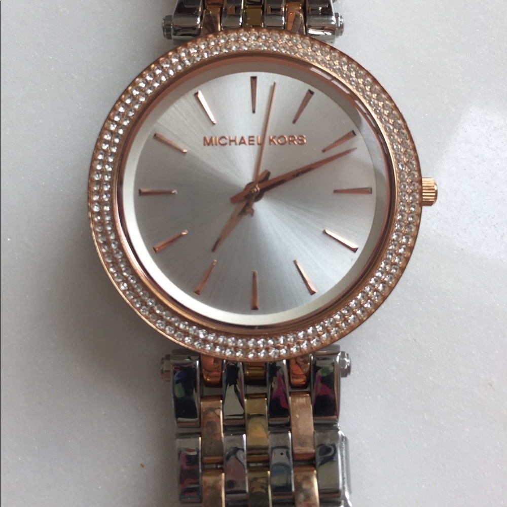Michel Kors gold and metal color bracelet watches