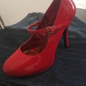 Red strapy heels by Bordello
