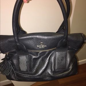 Kate Spade black purse with tassel.