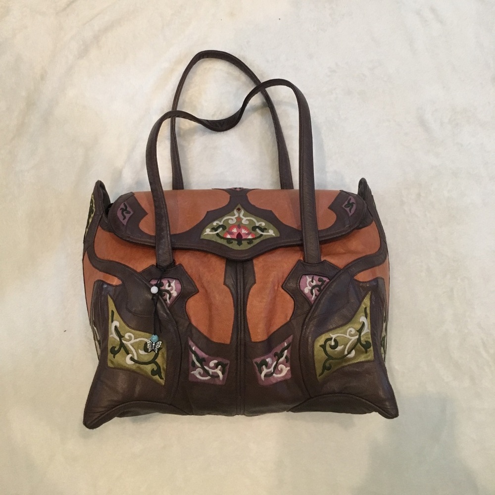 Hand stitched papillon handbag