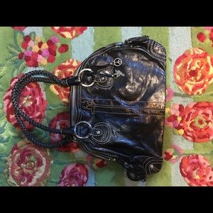 Limited Edition black Peace Purse from the Sak