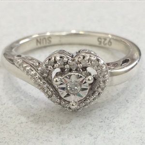 1-ring heart design .09ct tw diamonds