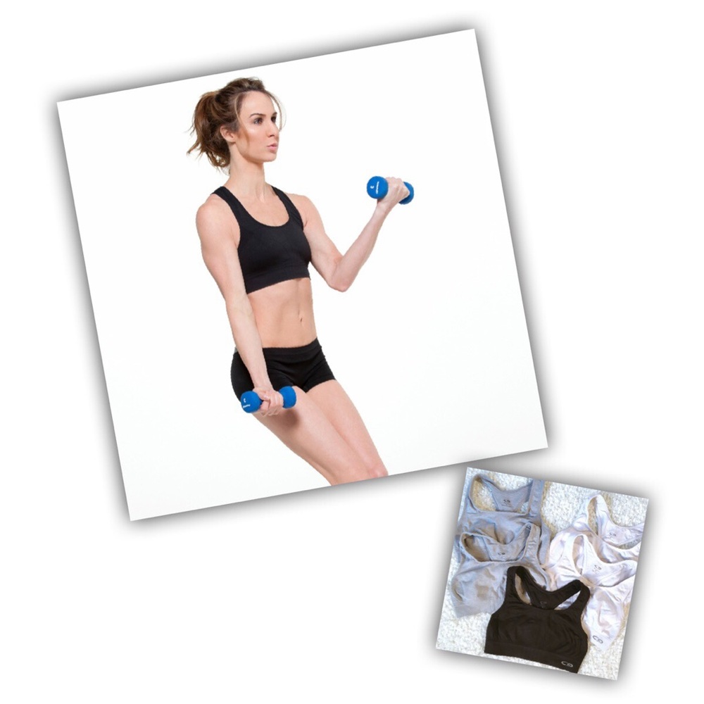 2 white, 2 gray and 1 black Champion sports bras