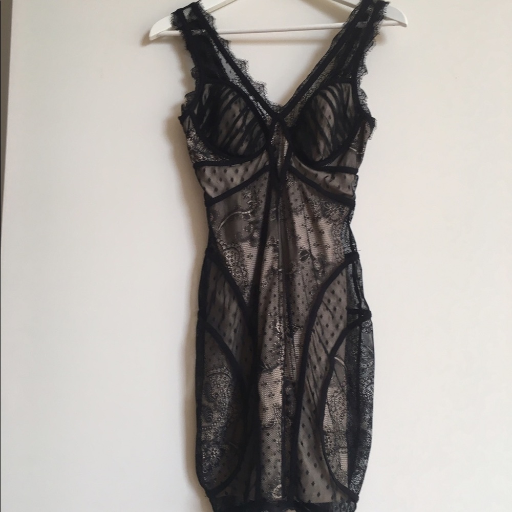 Black lace and nude Bebe mini bodycon dress