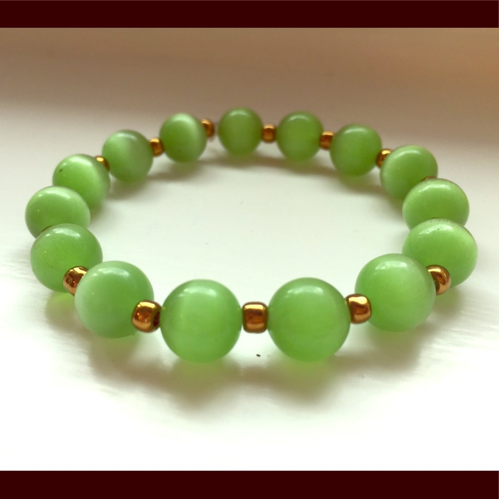 Handmade bracelet.  6mm cats eye beads