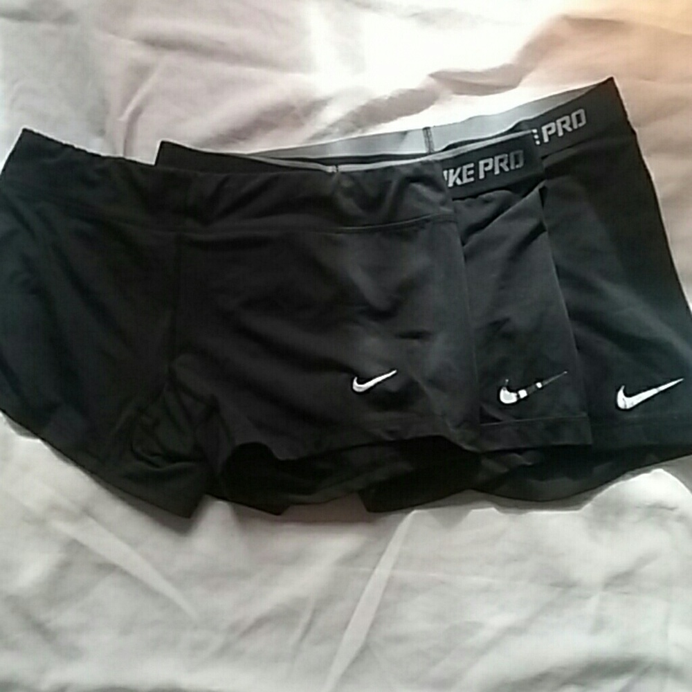 3 black Nike spandex