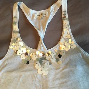 Cream sequined tank top with twisted back