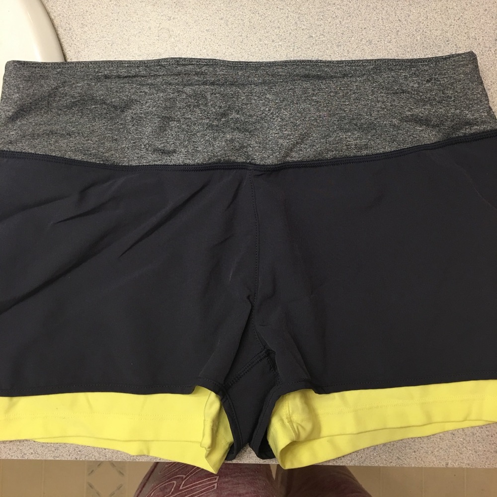 Gray workout shorts.