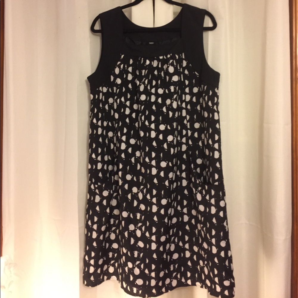 Black and white polka dot sleeveless dress