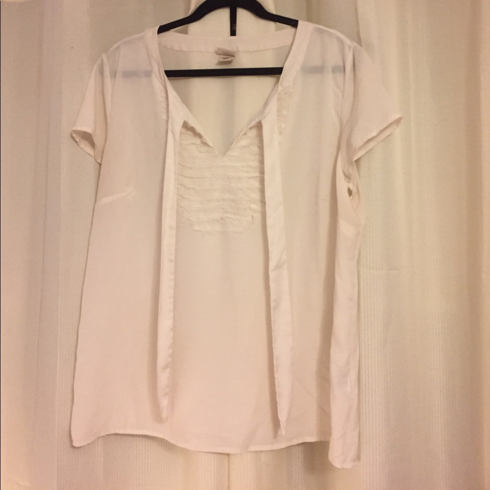 White blouse with ruffles and a bow!