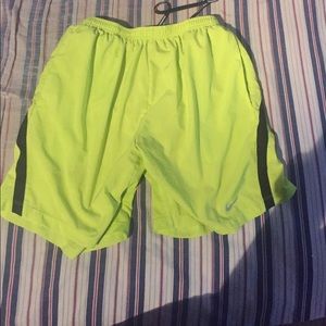 Neon Nike running shorts