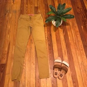 Gold or mustard skinny jeans