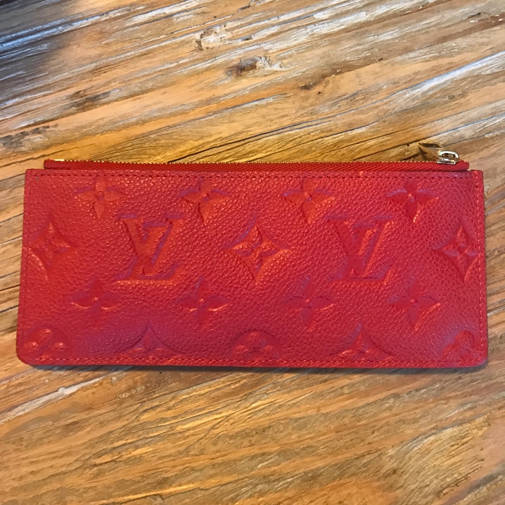 Authentic LOUIS VUITTON change purse.