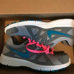 Brand new Nike Women's Revolution Shoes Size 9.5