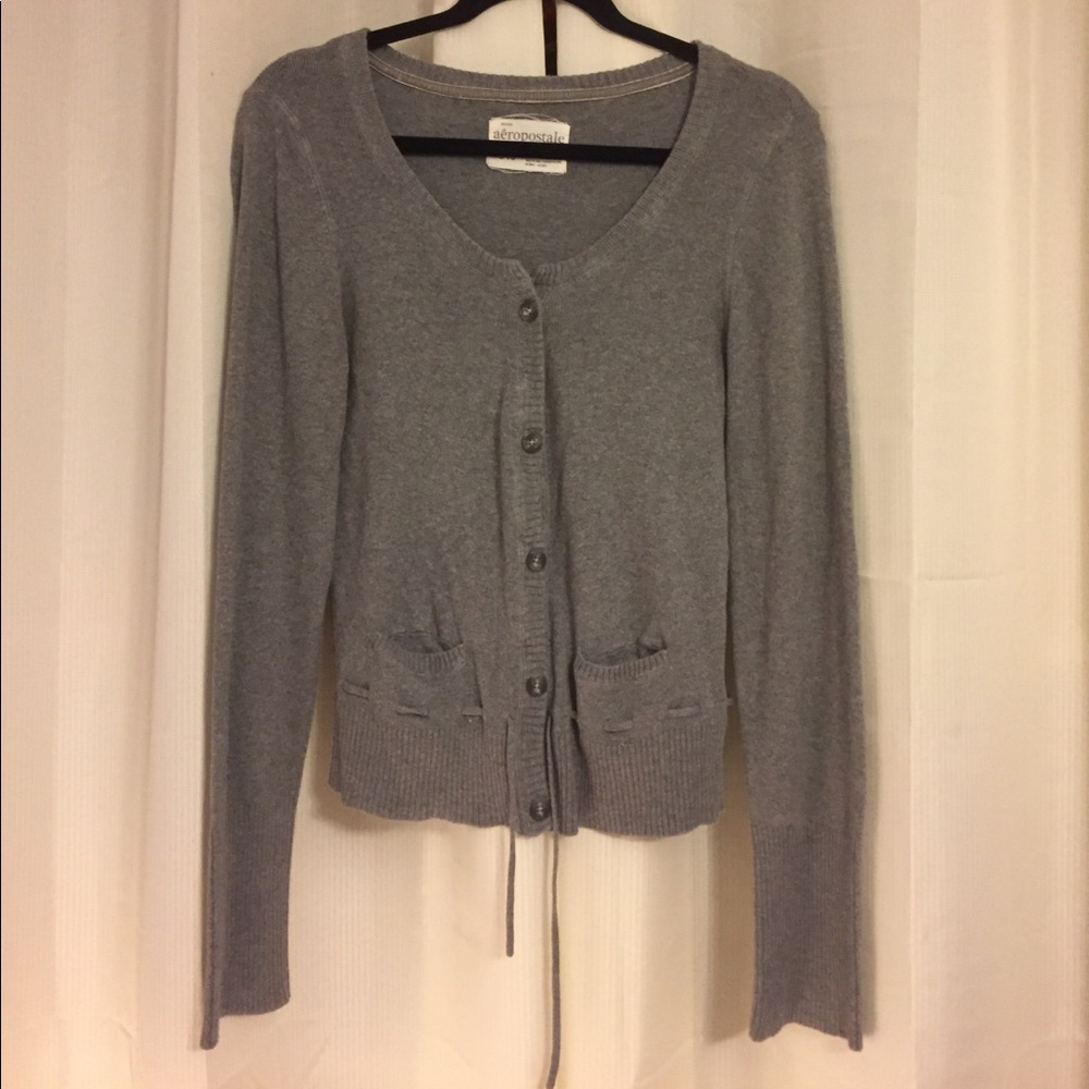 NWOT gray cardigan with detail at bottom