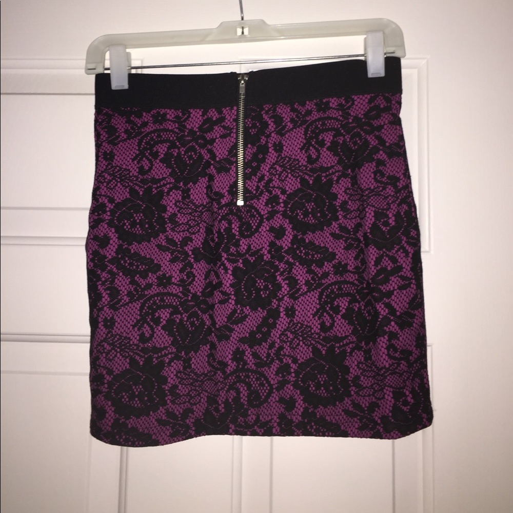 Pink and black mini skirts