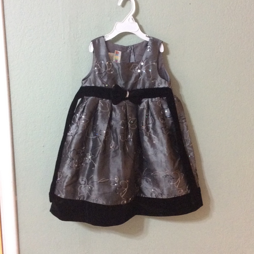 Gray black toddler dress with design.