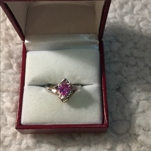 Pink sapphire and diamond ring