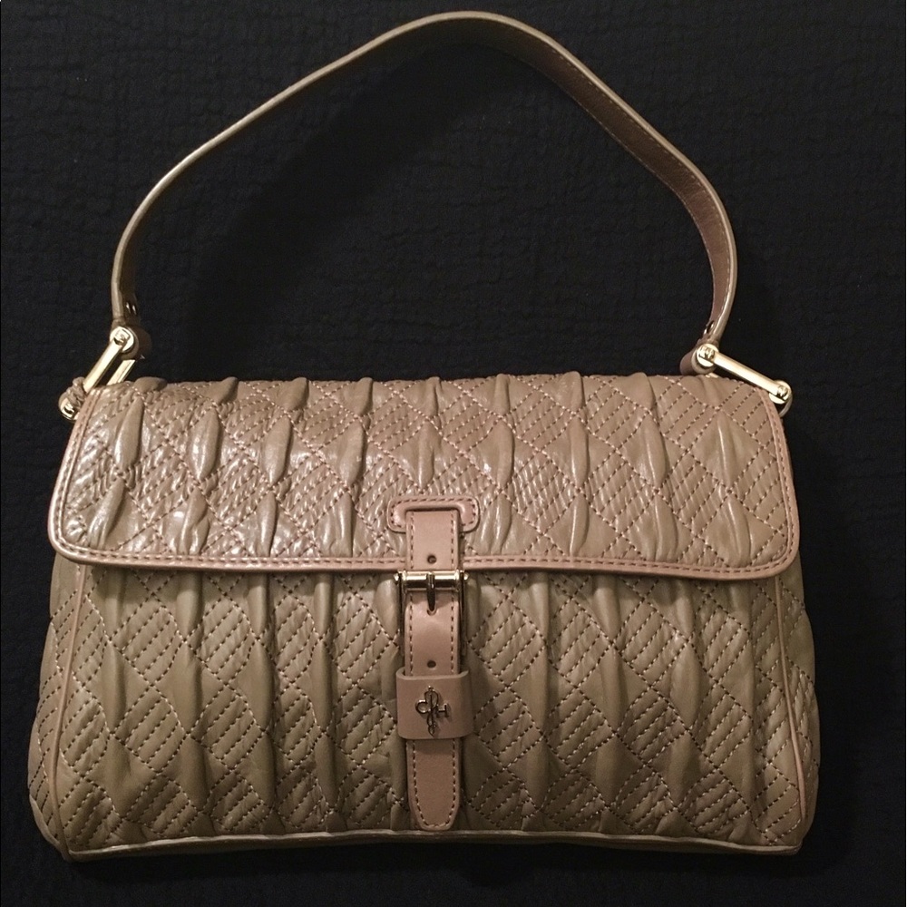 Shoulder length, Soft leather with gold hinges.