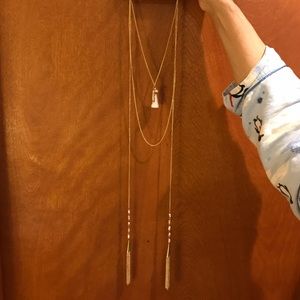 Gold toned long necklace