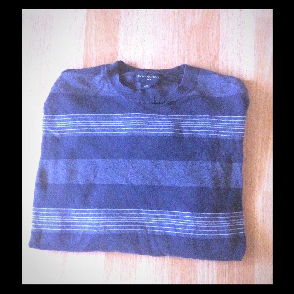 Dark Blue sweater with horizontal lines.