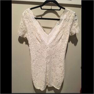 Low cut white lace bodycon dress